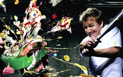 Gordon Ramsay hitting a cake with a bat.